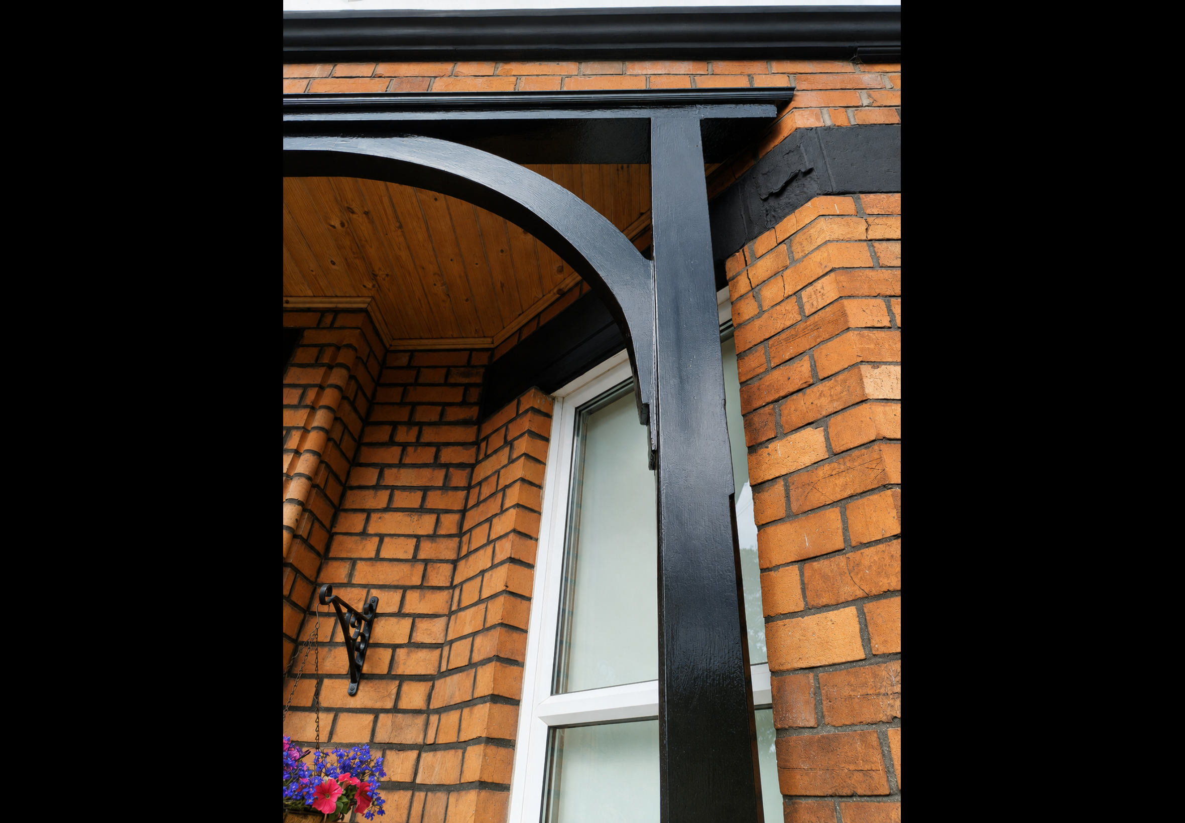 Completed exterior painting Bangor — repainted porch arch, timber post and entrance detail