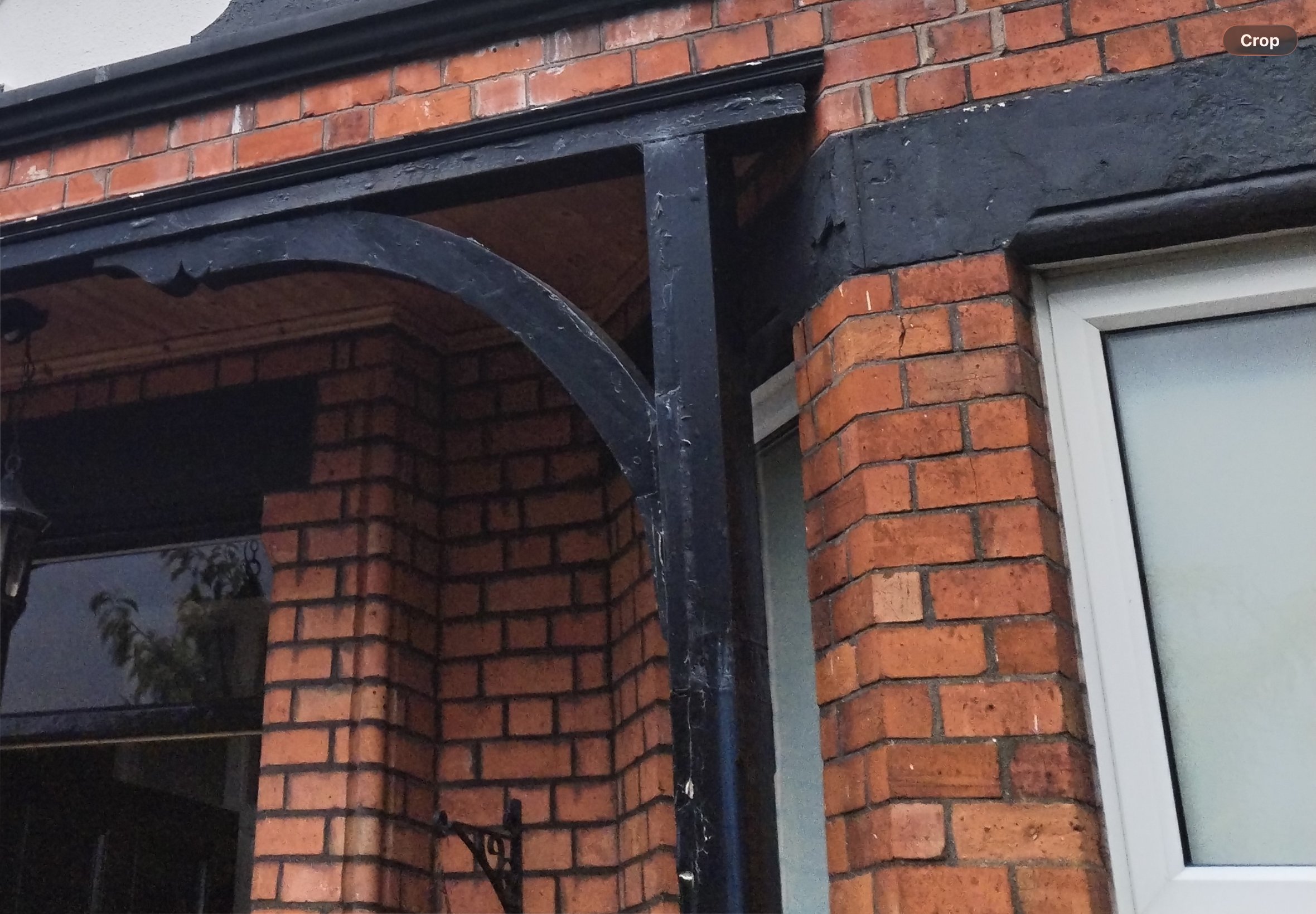 Exterior painting Bangor — deteriorated porch timberwork and render prior to preparation and repainting