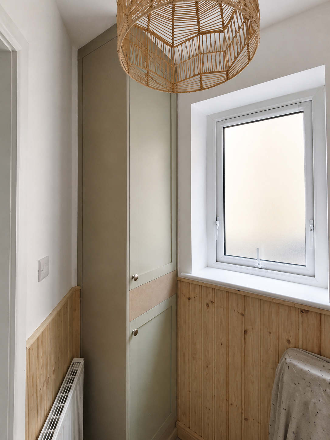 Cloakroom before — wall and panelling condition