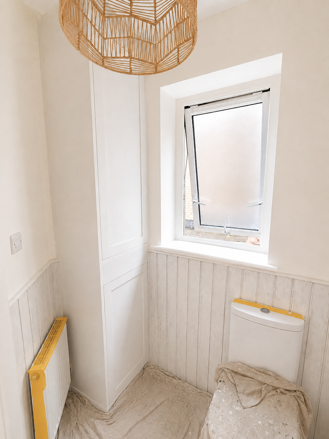 Cloakroom preparation — surfaces masked and protected